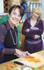 Vani teaching food preparation in a workshop 